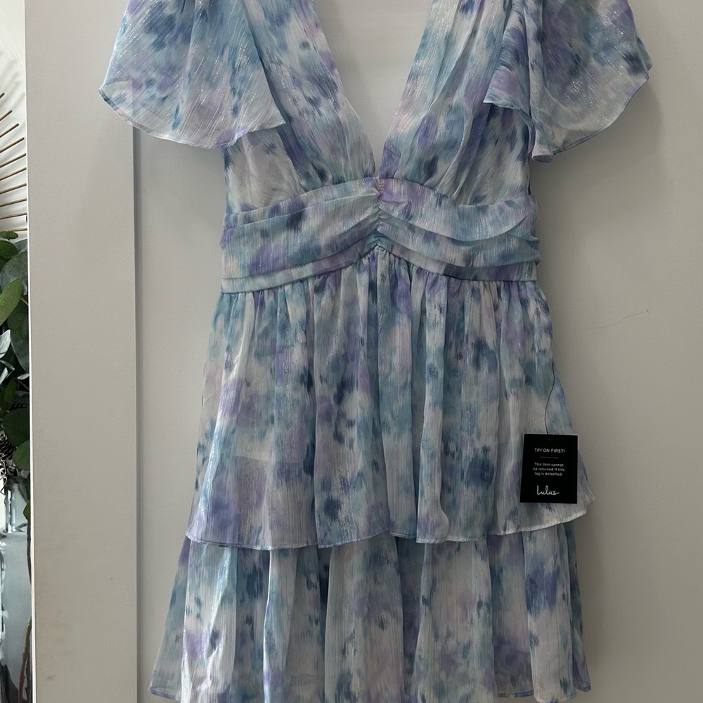 Sunny Evenings Blue Multi Lurex Flutter Sleeve Mini Dress. Never been worn.